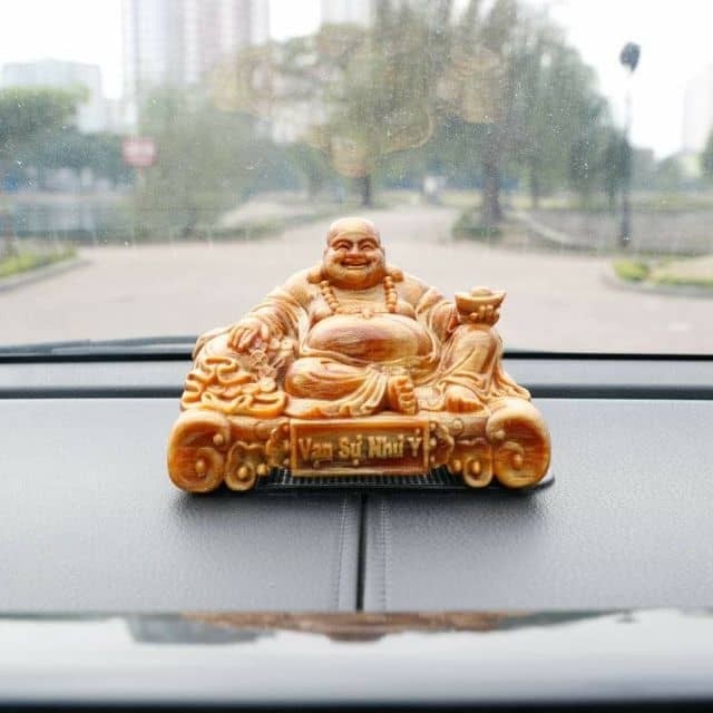 Tượng phật di lặc để ô tô gỗ huyết long