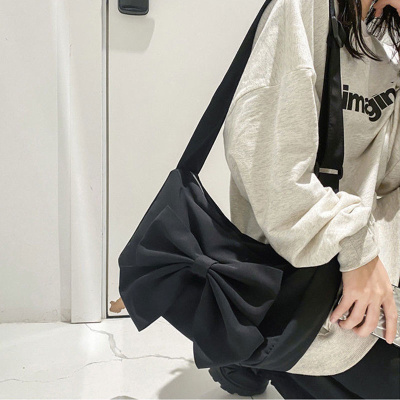 Túi đeo chéo YADOU vải canvas màu đen đính nơ sức chứa lớn dễ phối đồ thời trang cho học sinh