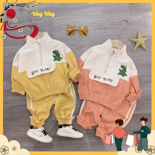 Bộ kaki cho bé qccc hình khủng long trắng phối vàng cam