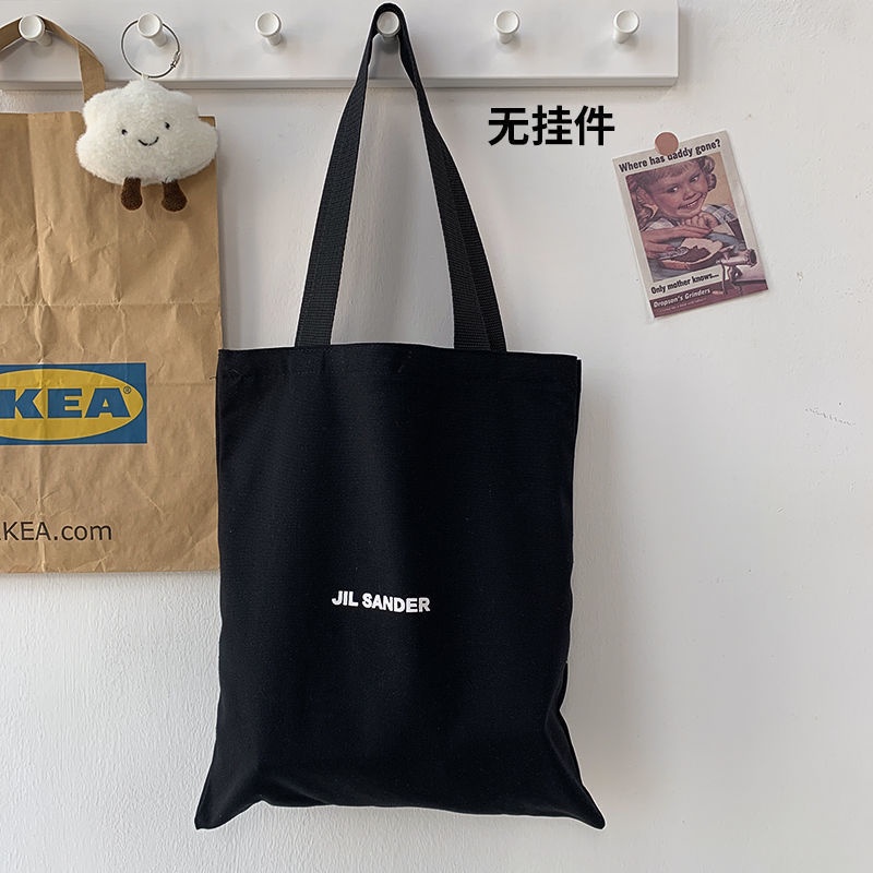 1 Ba Lô Vải canvas Màu Trắng Đen Đơn Giản