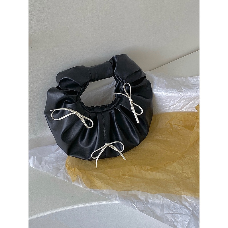 Túi xách tròn nhỏ đính nơ thời trang cho nữ