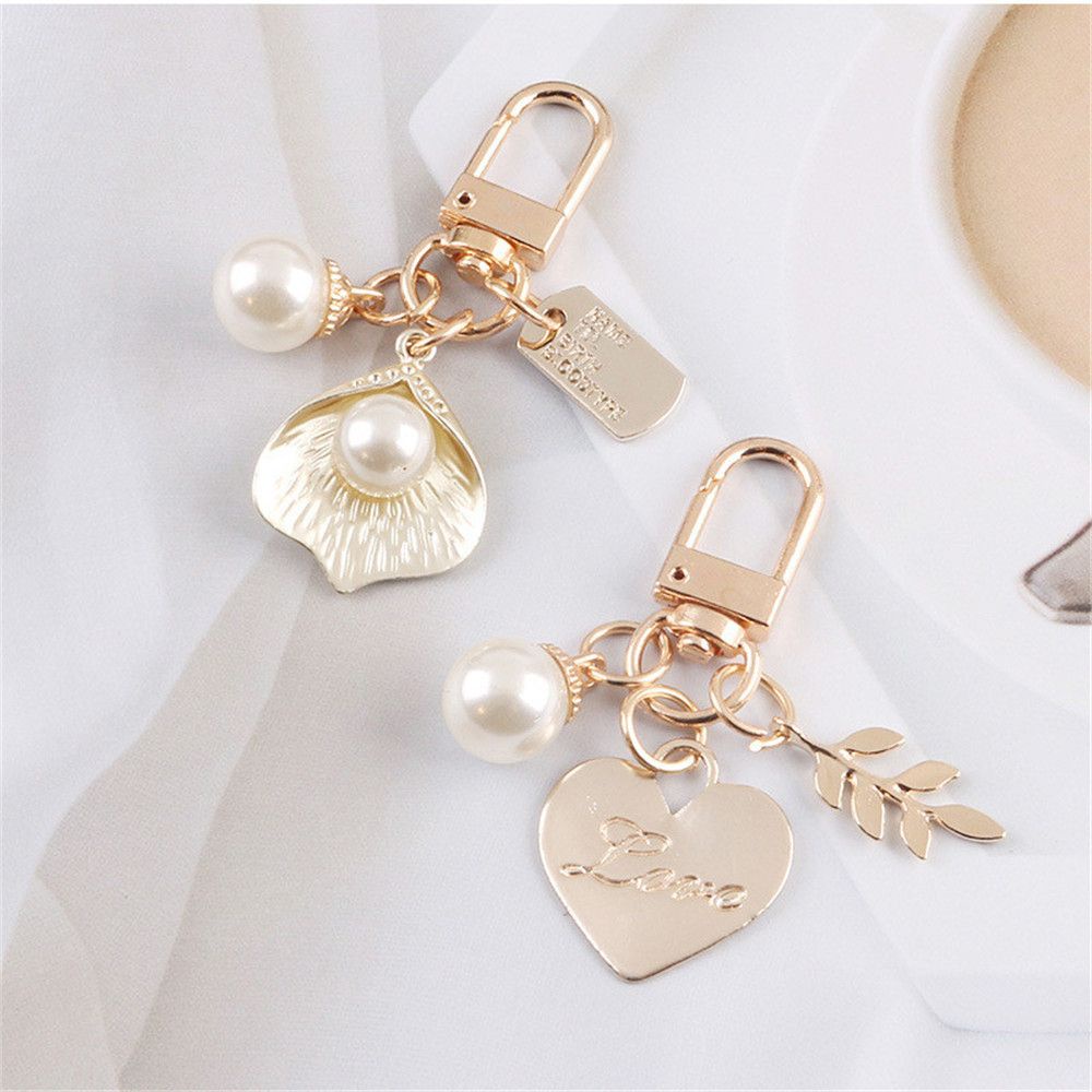Móc khóa hình chiếc lá dễ thương MIHAN1