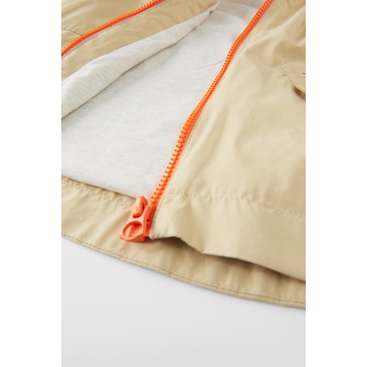 Áo Trench Coat Bé Gái Đáp Lưng Minnie Séc Be Nude ZR