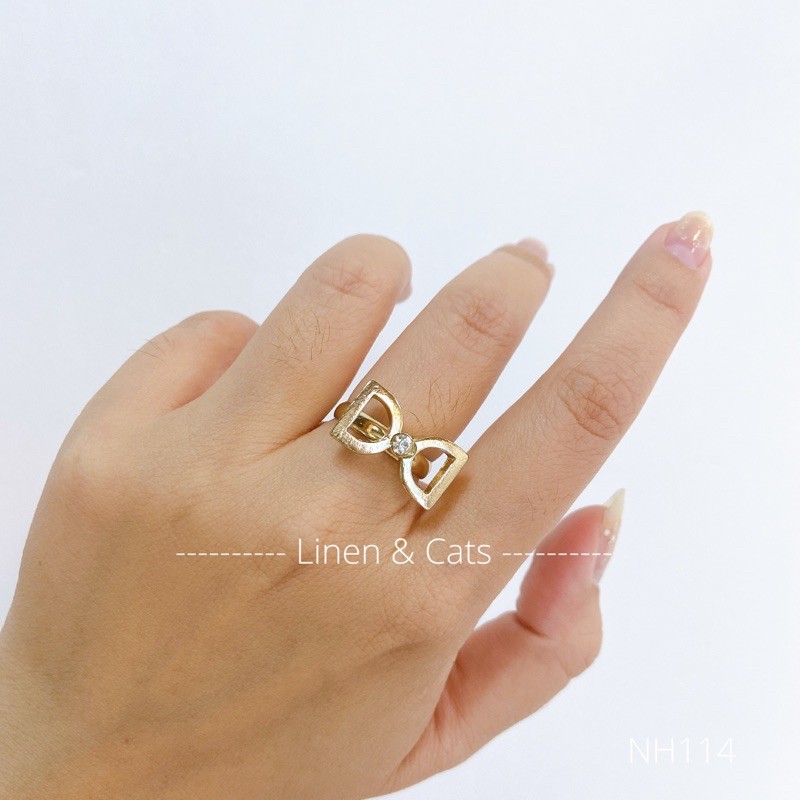 NH114 - NHẪN VÀNG HỌA TIẾT NƠ CÁCH ĐIỆU