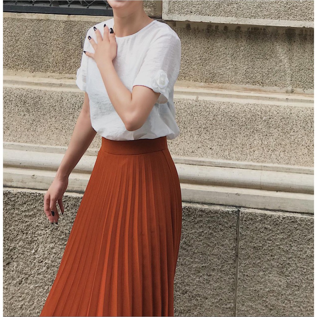 [Mã FASHIONMALLT4 giảm 15% đơn 150k] JOVEN-Chân váy dập ly mini cam đất | BigBuy360 - bigbuy360.vn