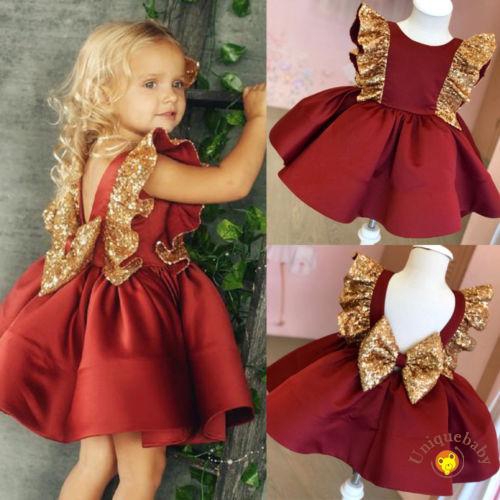 Đầm dự tiệc phối nơ đáng yêu cho bé gái