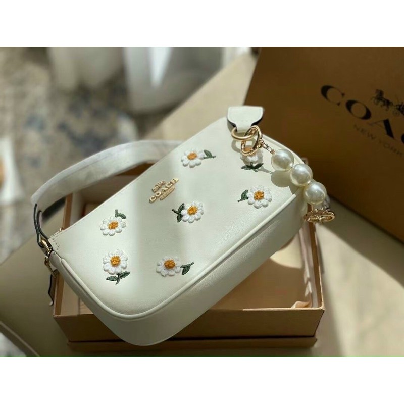 TÚI COACH NOLITA HOA CÚC