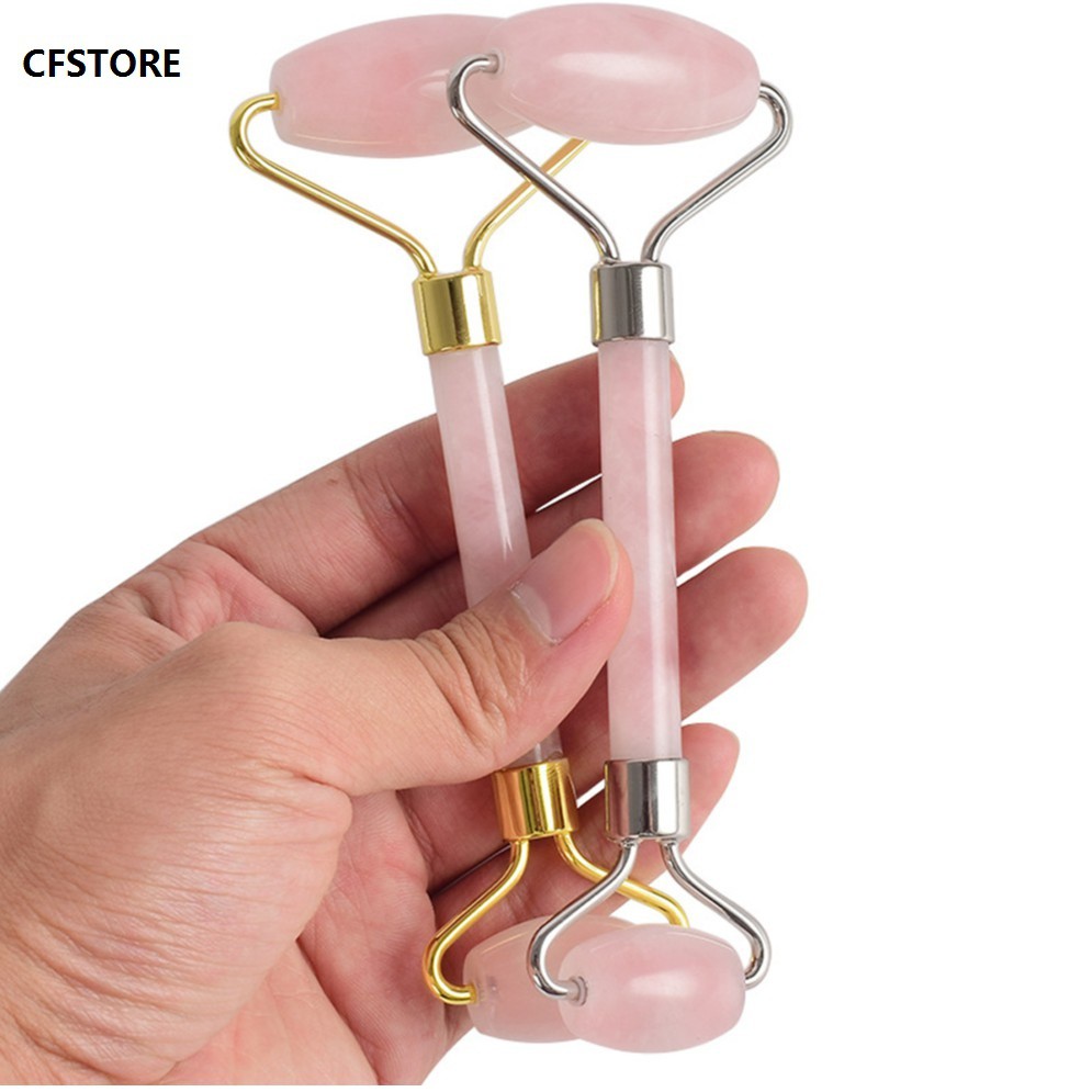 Cây lăn massage mặt màu hồng tự nhiên