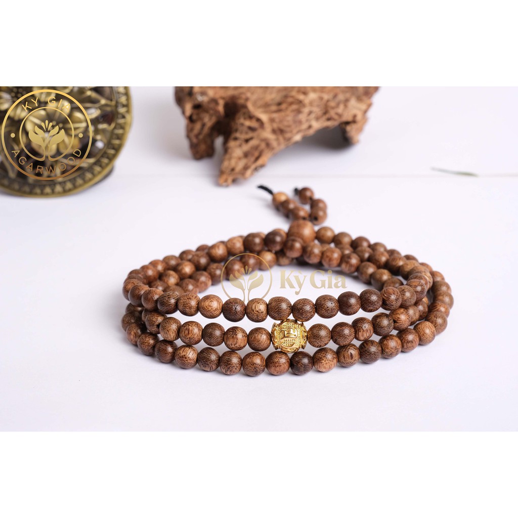 Vòng Tay Trầm Hương Kỳ Gia 8 Li 108 Hạt Charm Chữ Phạn