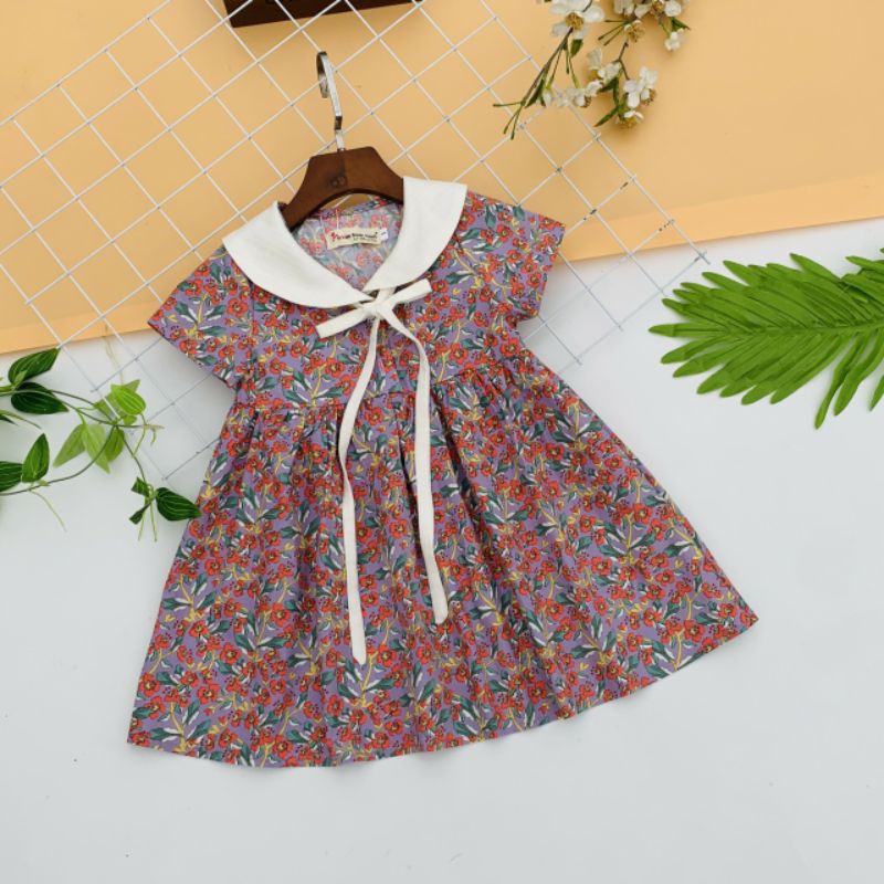 Đầm hoa nhí cổ sen trắng