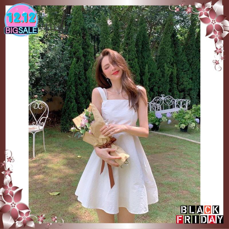 Đầm trắng hở lưng cột nơ dây chuỗi nhẹ nhàng xinh xắn | BigBuy360 - bigbuy360.vn