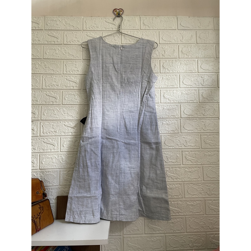 Đầm suông đắp tà cột nơ bên eo