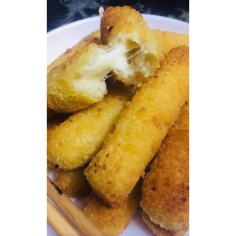 Phô mai que kéo sợi, ngon hơn khi còn nóng. Cây phô mai kéo sợi thơm ngon.