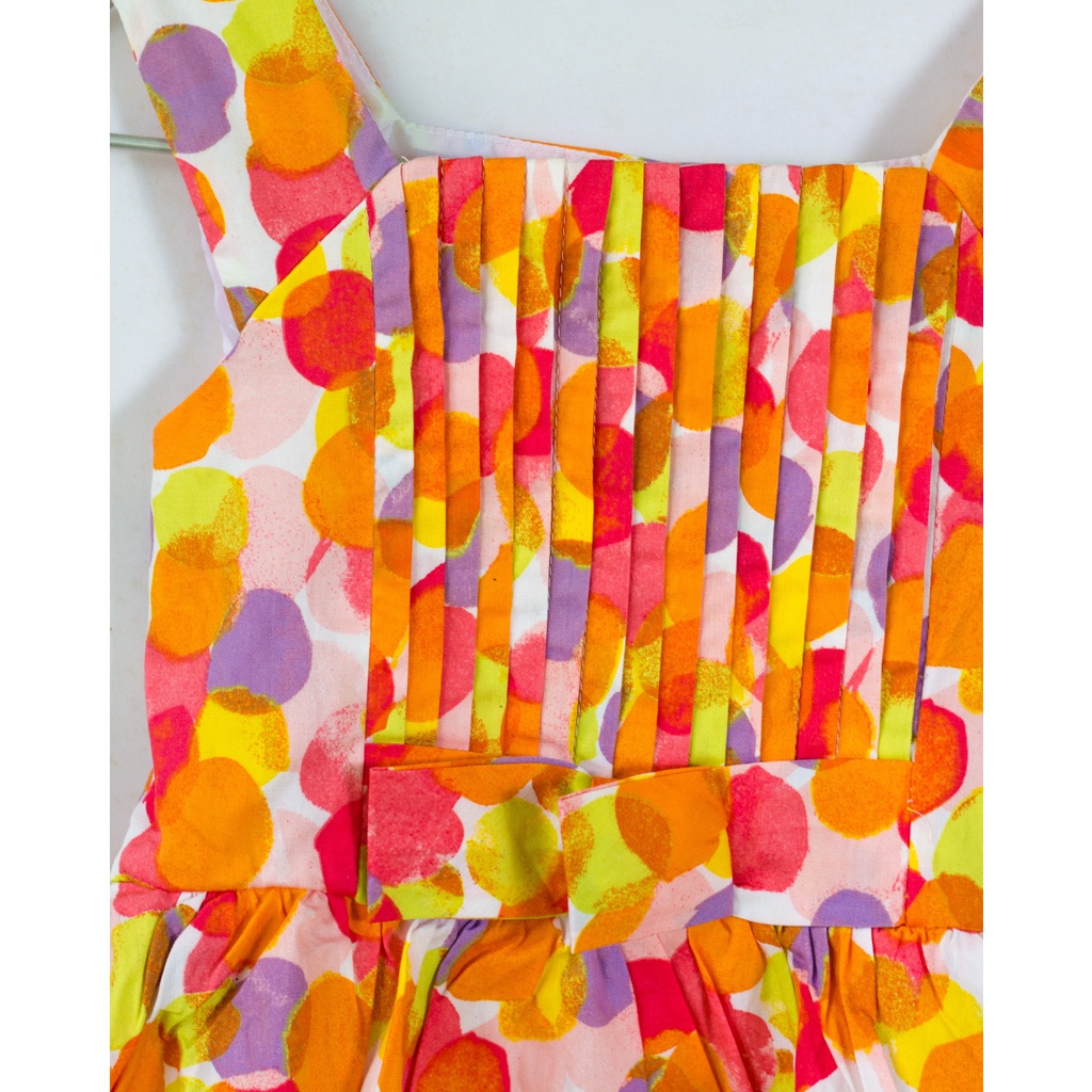 Váy bé gái chấm tròn màu sắc sặc sỡ cam vàng đỏ 5-6 tuổi