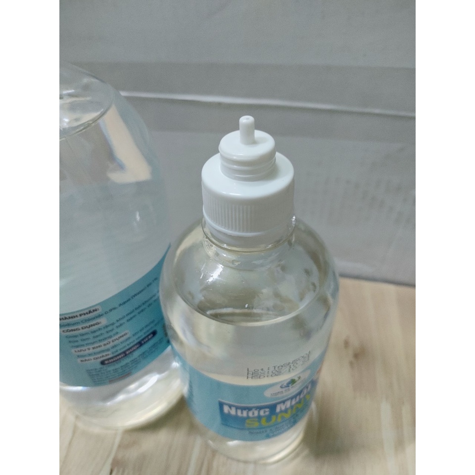 Nước muối sinh lý Sunny Natriclorid 0.9% súc miệng bảo vệ khoang miệng làm sạch da mặt ngăn ngừa mụn 500ml 1 Lít