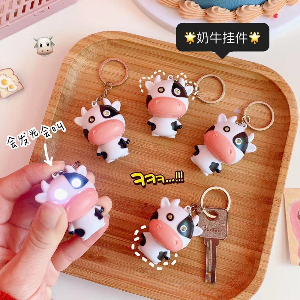 Móc khóa bò sữa hoạt hình phản quang sáng tạo cho cặp đôi