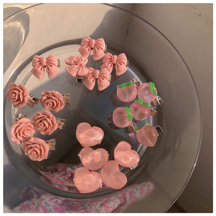 Kẹp tóc màu hồng phong cách thời trang mới cho nữ