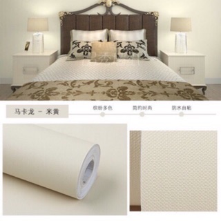 10m giấy dán tường màu trơn vân sần vàng nhạt , khổ rộng 45cm ( sẵn keo dán)