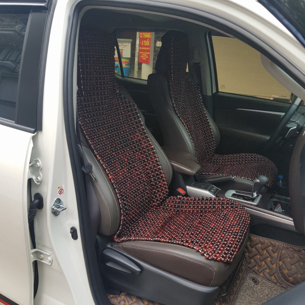 Sản Phẩm Đệm lót ghế ô tô hạt gỗ Cẩm Lai 100% tự nhiên tựa lưng massage trên ô tô .