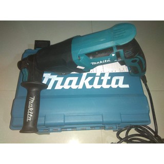 Máy khoan bê tông Makita HR2610 Madein TháiLan, 1000W đủ 3 chức năng khoan sắt, gỗ, khoan bê tông và đục bê tông.