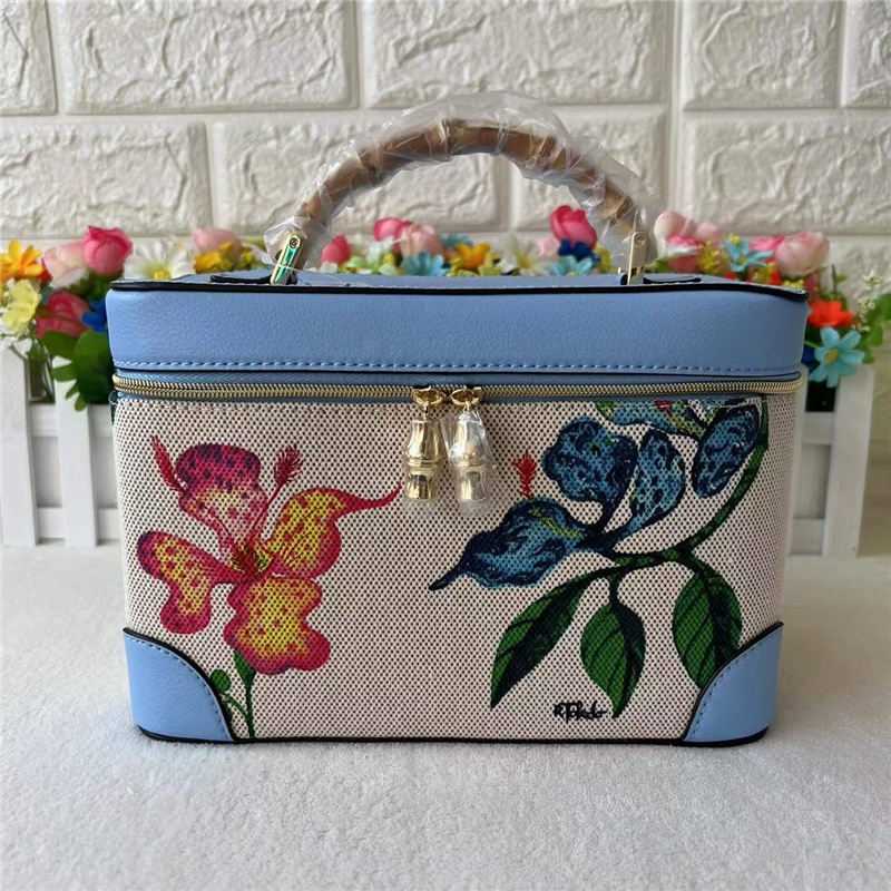 Túi Đựng Mỹ Phẩm Cầm Tay Màu Be In Họa Tiết Thời Trang Tiện Lợi