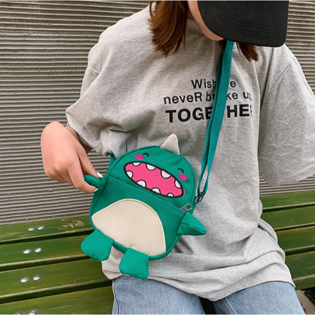 Túi đeo chéo khủng long