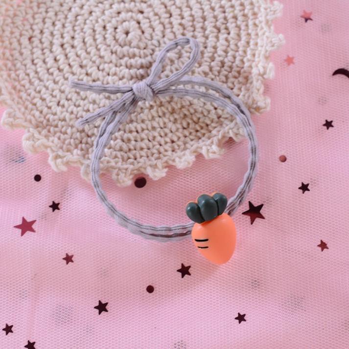 Chun buộc tóc đính củ cà rốt   Clovershop68