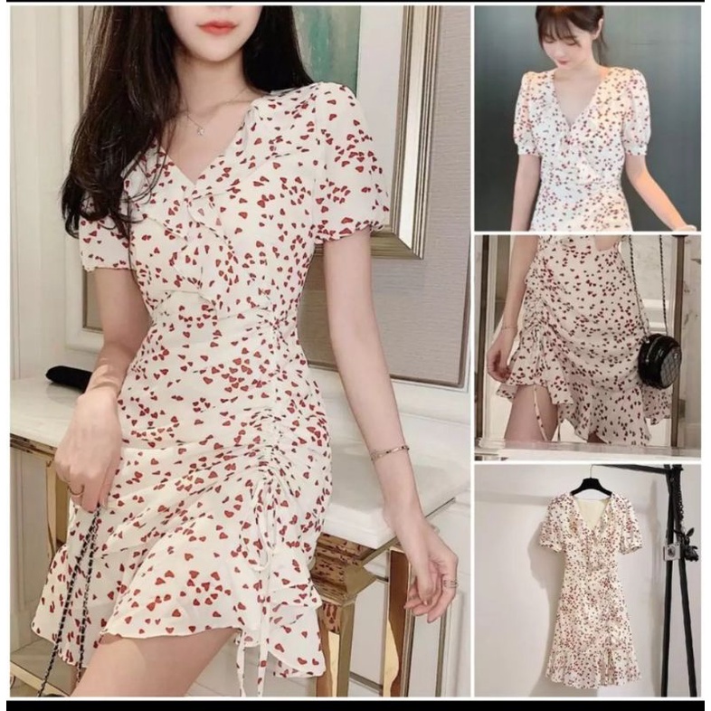 đầm cổ tim viền bèo đuôi cá tay bo có rút dây 1 bên đầm dài ngang gối,chất vải voan in hình trái tim free size 44-54kg
