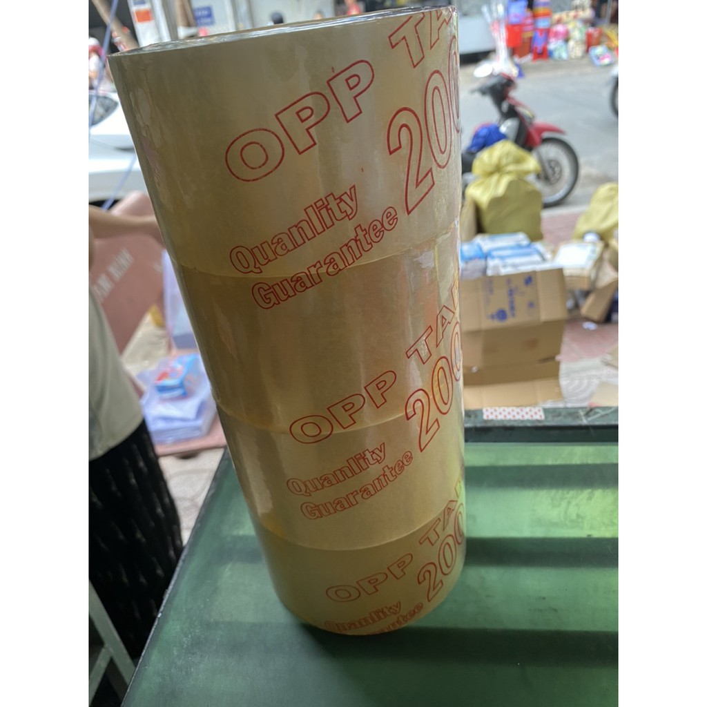 Cây 4 cuộn băng keo 200yard trong 7cm nặng 2kg