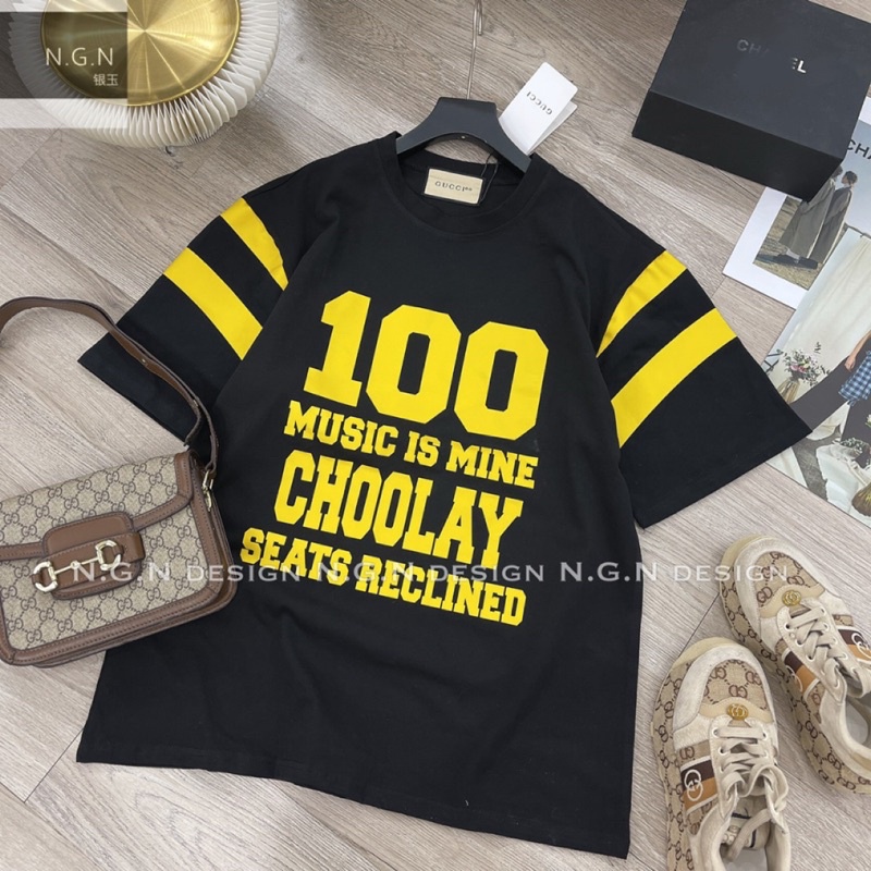 Áo phông đen chữ vàng GC