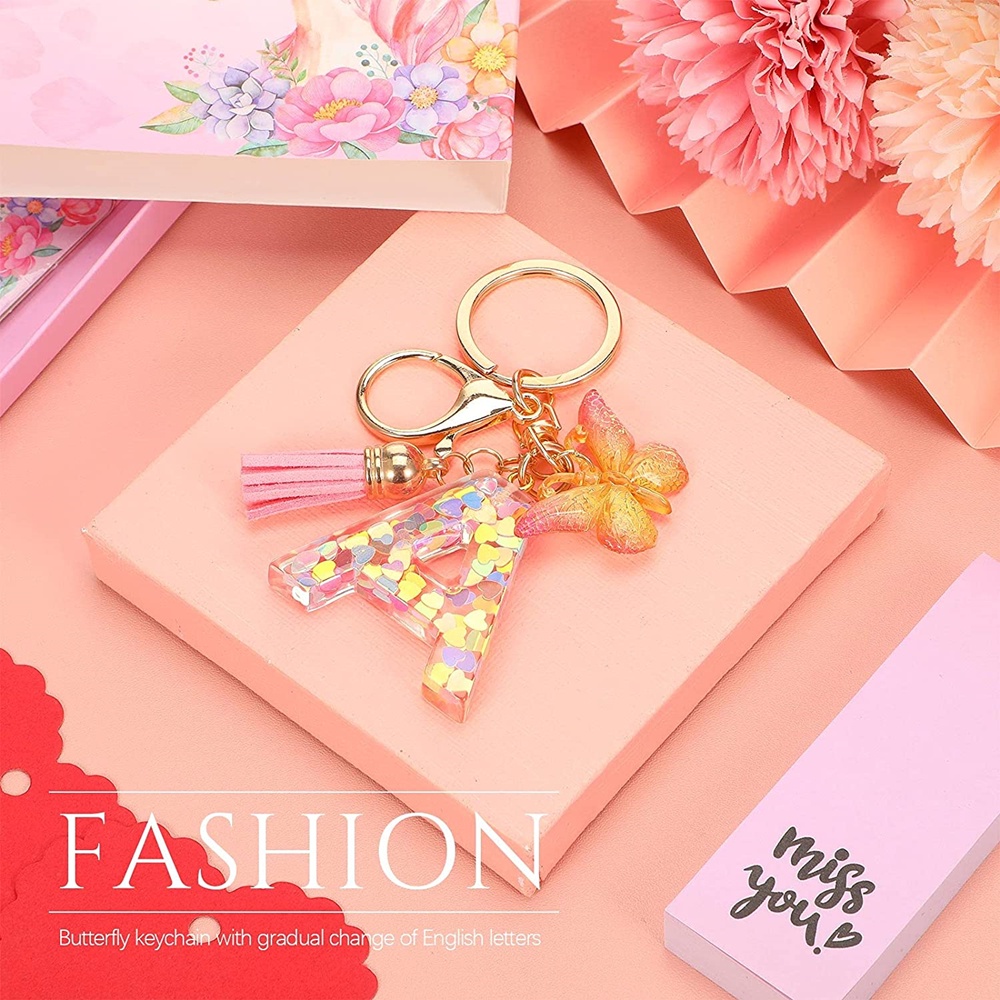 Móc Khóa Mặt Hình 26 Chữ Cái Bằng Nhựa Resin Màu Hồng Gradient Phối Tua Rua Độc Đáo