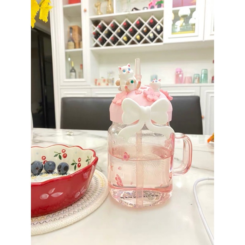 Ly thủy tinh STARBUCKS màu hồng Sakura có quai cầm và ống hút dung tích 400ml