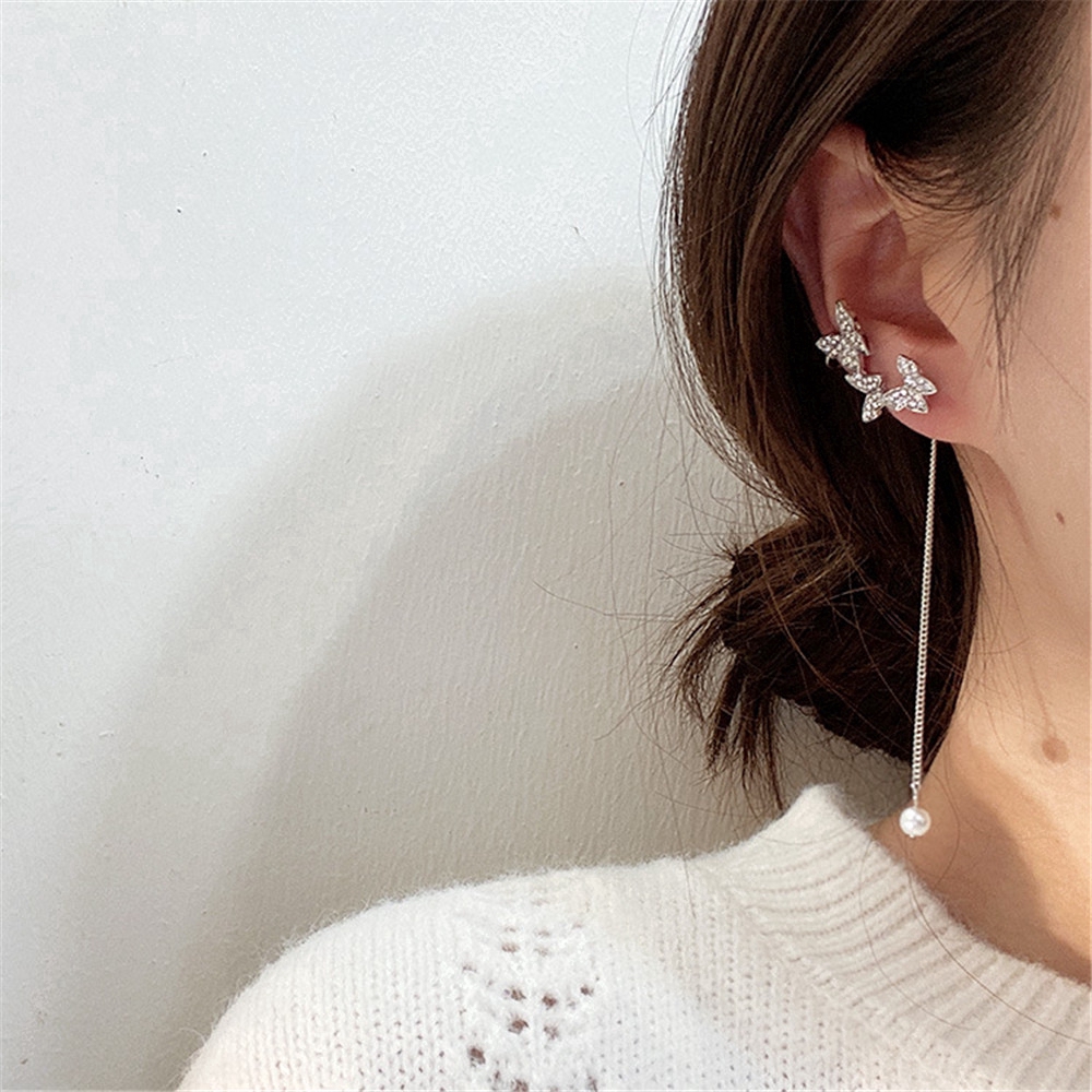Cặp khuyên kẹp vành tai hình bướm màu bạc phối tua rua dài không đối xứng kiểu retro cho nữ