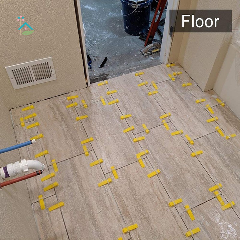 Bộ dụng làm san bằng gạch lát sàn gồm 400 kẹp giữ khoảng cách 1/8" và 200 dụng cụ khóa chặt có thể tái sử dụng