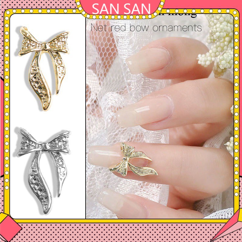 Charm nơ đính móng