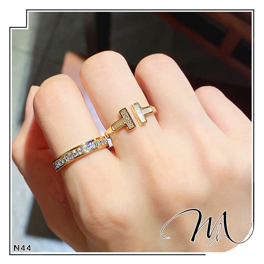 Nhẫn nữ Titan freesize chữ T đính đá phối xà cừ - Măng’s House N44