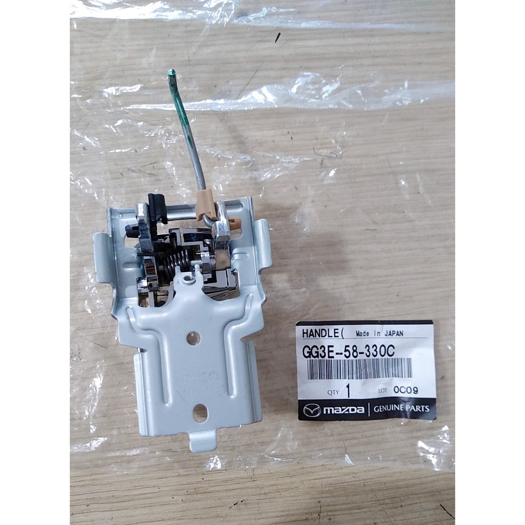 Tay mở cửa trong trước, sau phải Mazda 626 2001+ chính hãng