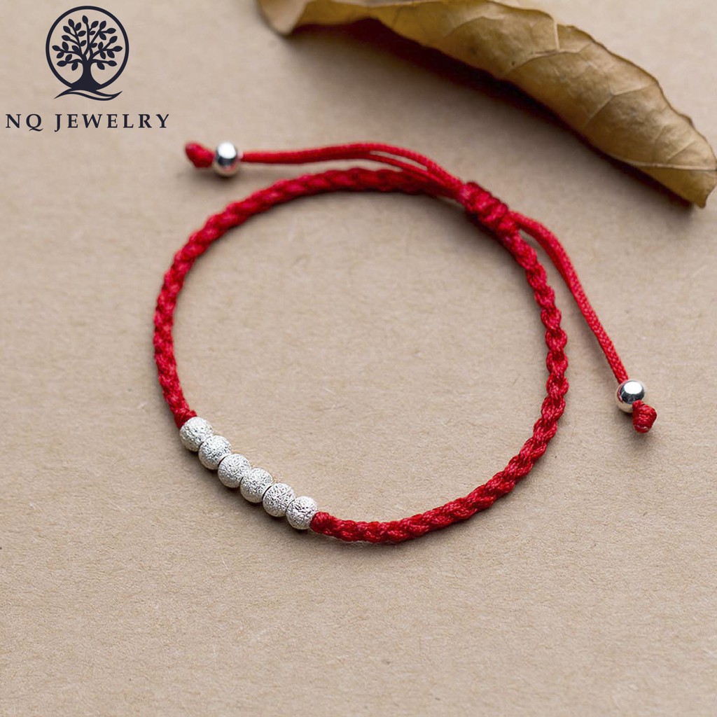 Vòng thắt dây đỏ bi cát - NQ Jewelry