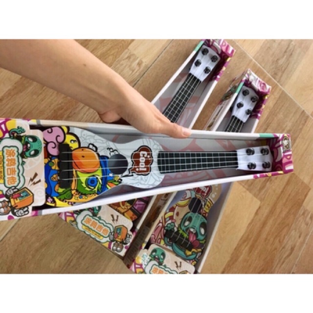 Đồ Chơi Đàn Guitar mini cho bé cảm thụ âm nhạc