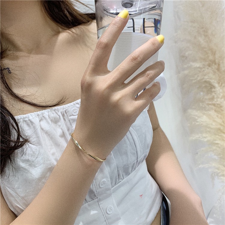 Vòng tay xoắn bằng kim loại thời trang Hàn Quốc cho nữ