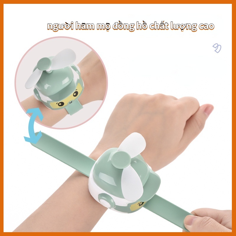 Quạt điện mini chính hãng dạng đồng hồ đeo tay phong cách hoạt hình sạc usb có thể để bàn tiện dụng