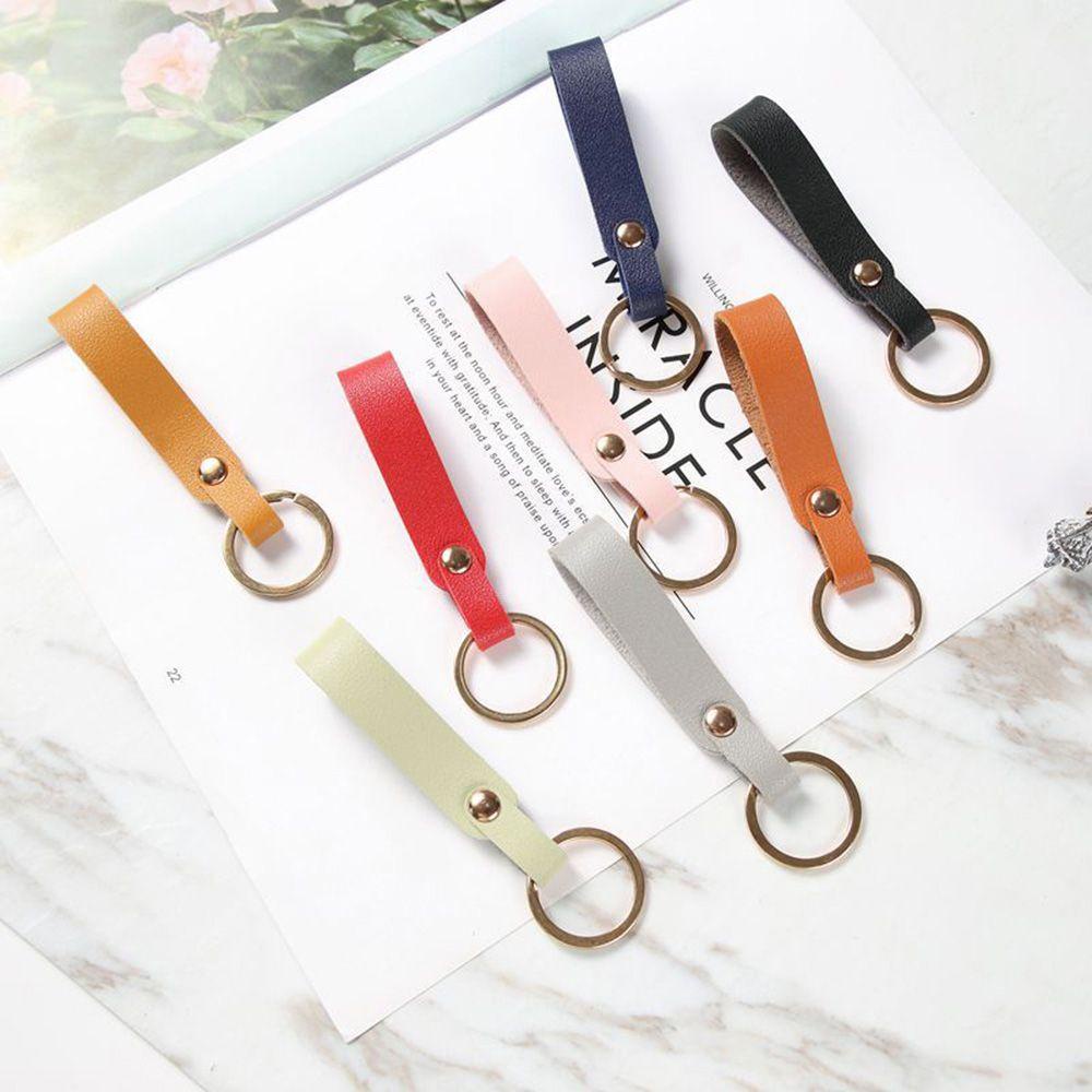 Móc Khóa Da PU Hình Chai Nước Độc Đáo