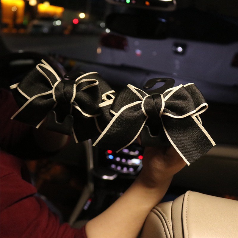 Móc treo đồ sau ghế xe ô tô - Móc treo đồ xe hơi hình nơ