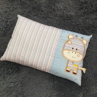 Gối mátxa trẻ em