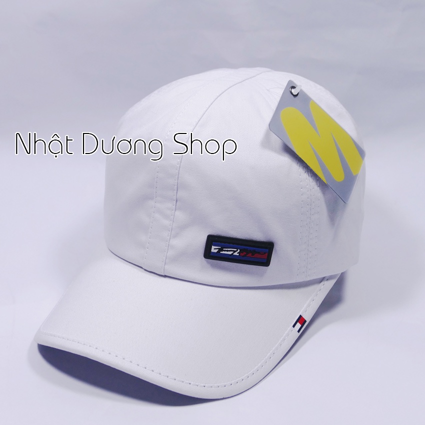 Mũ lưỡi trai mặt da ép chữ TomMy - Chất liệu vải Kaki bền chắc kết hợp với chữ ép tạo nên sự nổi bật cho người đội