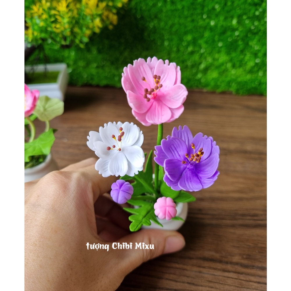 Bộ tượng Tứ Không mẫu đeo chuỗi kèm chậu hoa đất sét và chân đế Tài Lộc Phát
