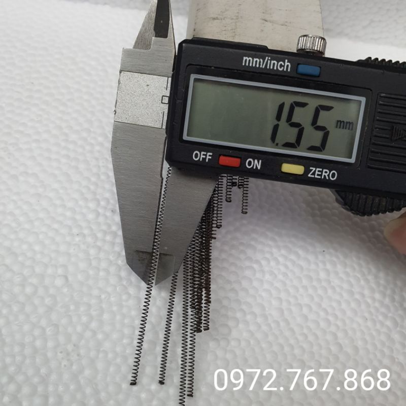 Lò xo nén, đường kính ngoài 1.6mm, thép 0.25mm, dài 200mm