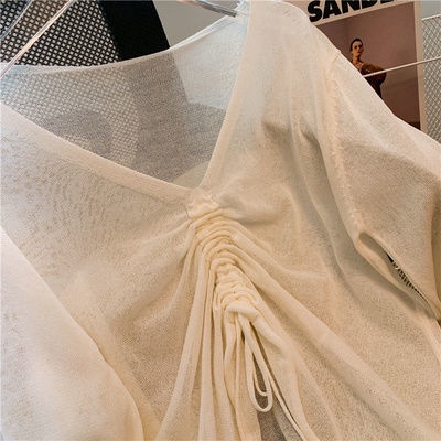 Áo Dệt Kim Tay Loe Cổ Chữ V Phối Dây Rút Màu Trong Suốt Thời Trang Cho Nữ