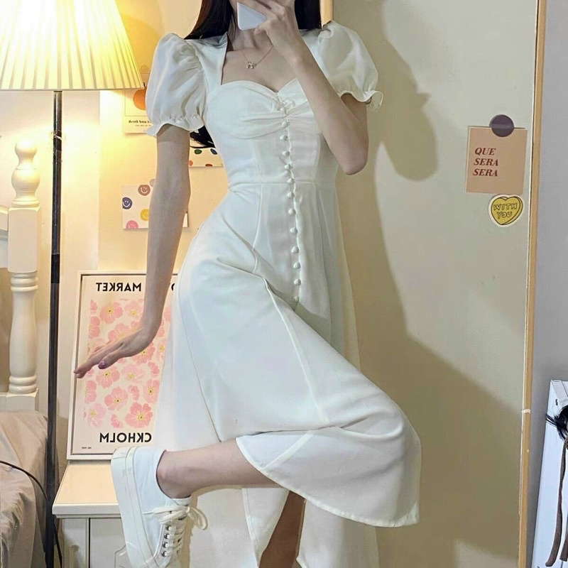 Đầm trắng nút bọc