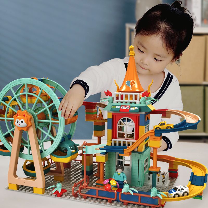 Bộ đồ chơi lắp ghép mô hình lâu đài Vòng xoay Mặt trời có làn trượt xe cho bé trai và bé gái
